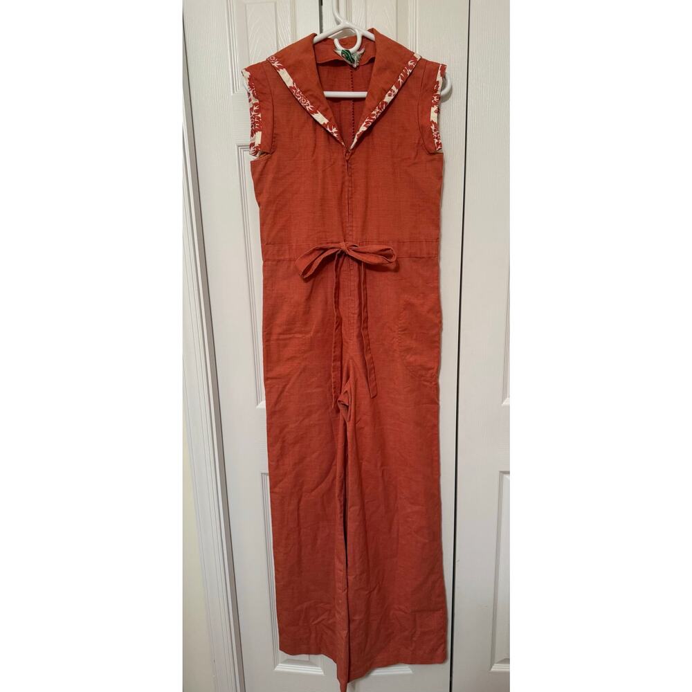 Patty O’Neil orange cream jumpsuit